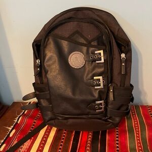 Men's Black Faux Leather Front Backpack with Buckle Accents